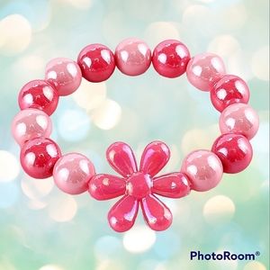 Choice of pink or purple bead stretch bracelets for girls.